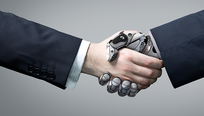Graphic of a human shaking hands with their technology support